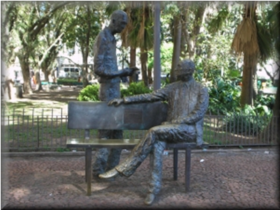 Stockinger e Tregnago, 2001<br /><em>Drummond e Quintana</em>, bronze<br />Praça da Alfândega